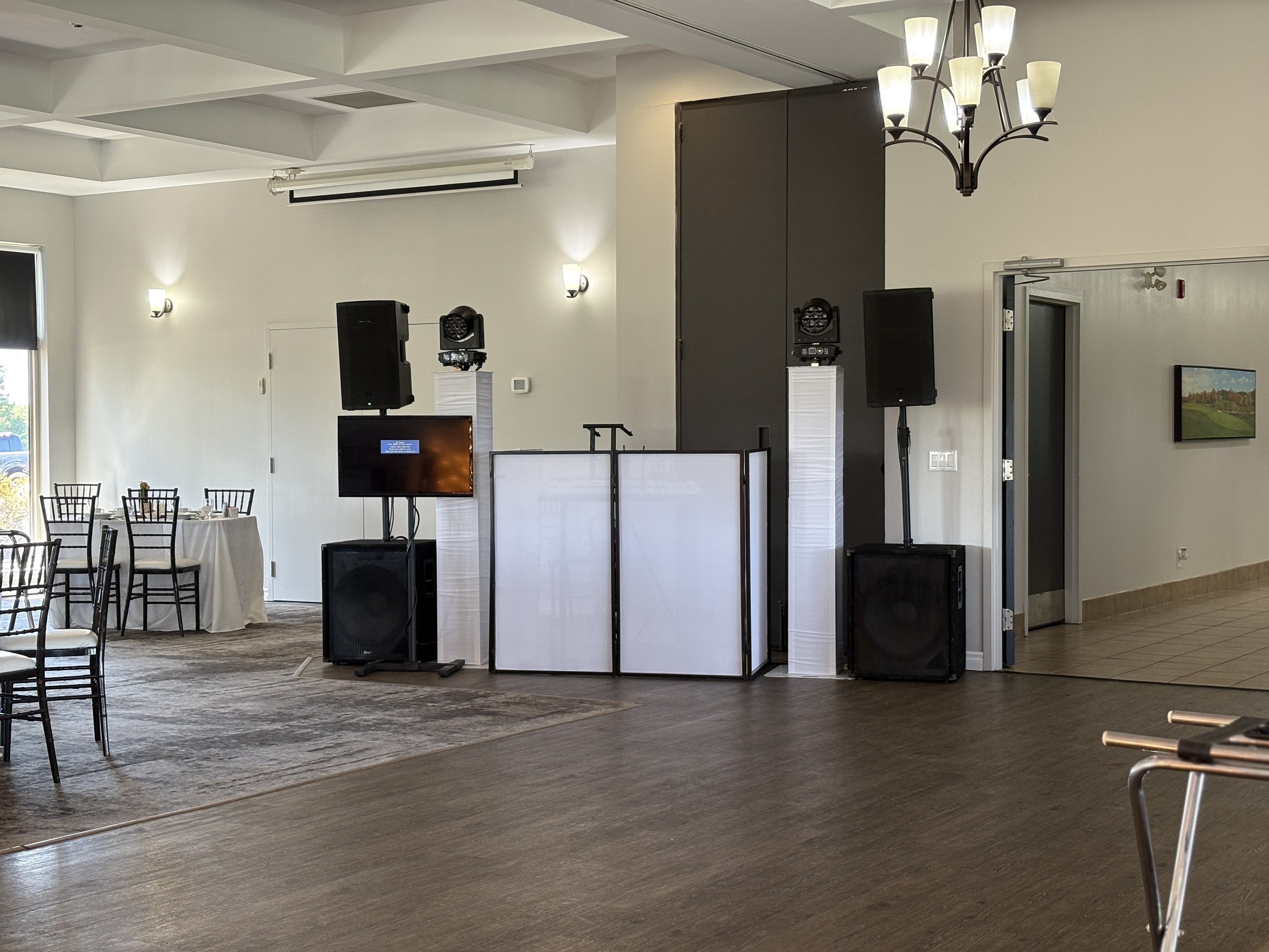 Smileshine Entertainment DJ setup with dance floor lighting at Tangle Creek Golf Course